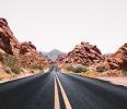 road going between mountains